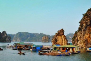 Halong Bay - Cua Van fishing village - Me Cung Cave (B, L, D)